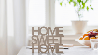 Home Sweet Home sign on a table